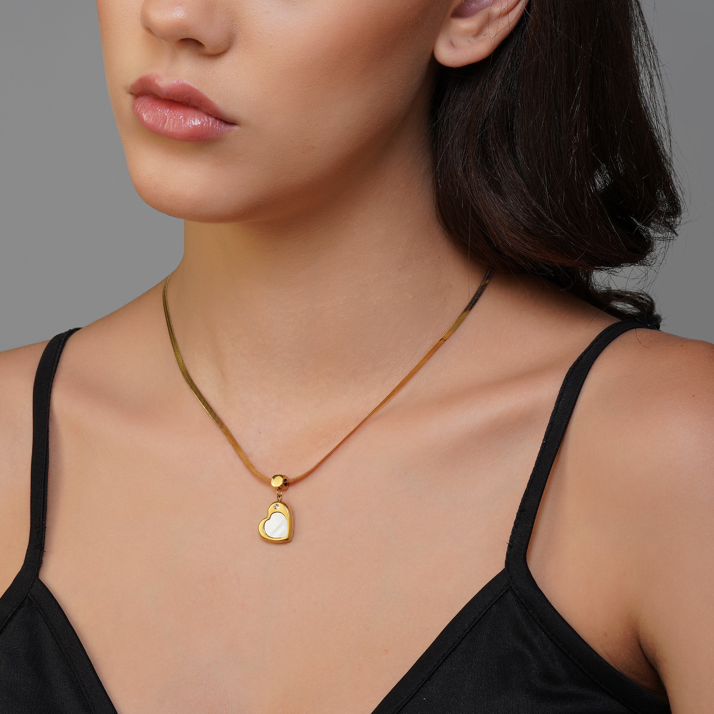 Gold Choke with A Heart Pendant