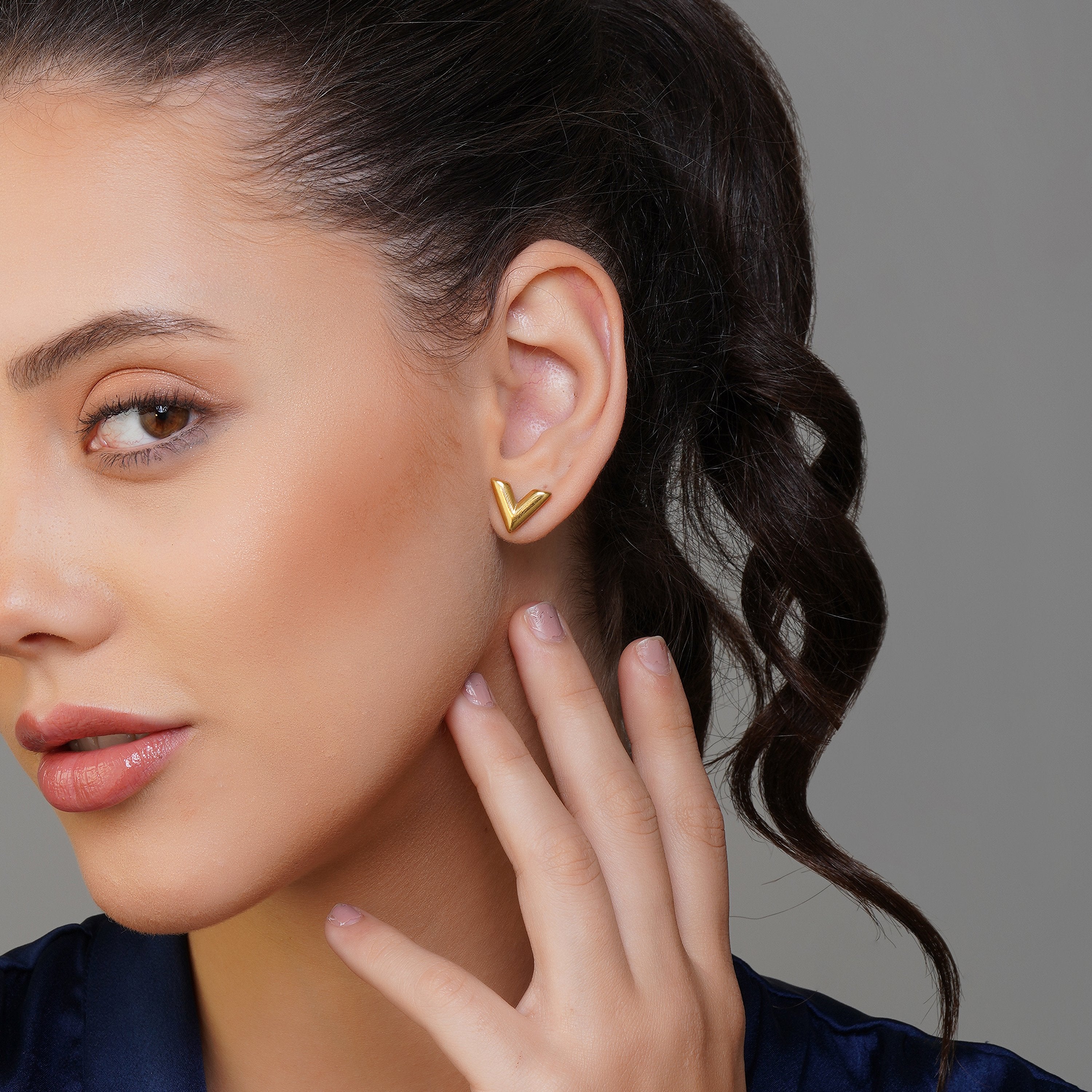 Gold Stud Earrings.